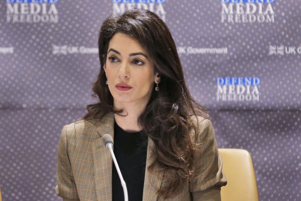 FILE - In this Wednesday, Sept. 25, 2019, file photo, attorney Amal Clooney listens during a panel discussion on media freedom at United Nations headquarters. Human rights lawyer Clooney is scheduled to deliver a keynote speech Thursday, Nov. 11, 2021, in a CEO summit during the Asia-Pacific Economic Cooperation forum, also known as APEC, hosted by New Zealand. (AP Photo/Seth Wenig, File)