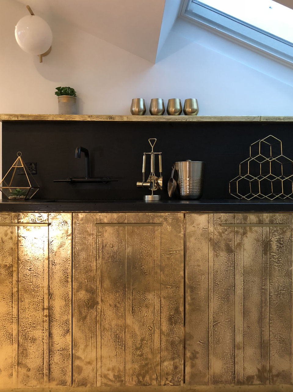 10) Custom Brass Fronts + Black Surfaces