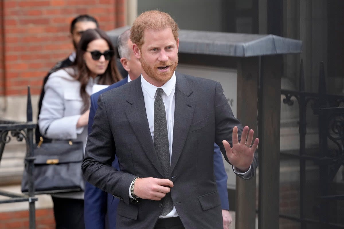 Prince Harry is taking legal action against three newspaper groups in the UK as part of the long-running phone hacking scandal  (AP)