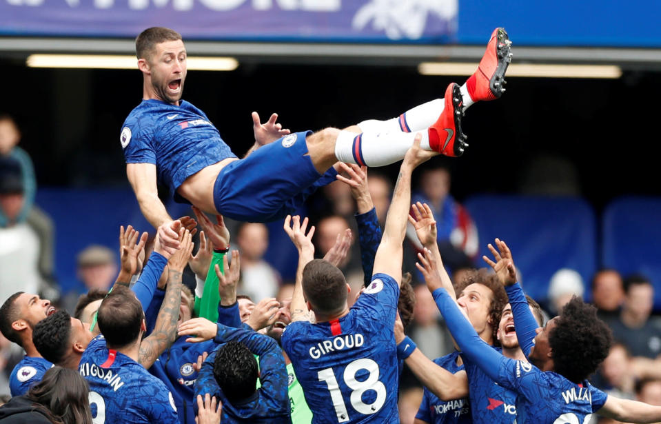 Soccer Football - Premier League - Chelsea v Watford - Stamford Bridge, London, Britain - May 5, 2019  Chelsea's Gary Cahill is thrown in the air by his team mates after the match    Action Images via Reuters/Matthew Childs  EDITORIAL USE ONLY. No use with unauthorized audio, video, data, fixture lists, club/league logos or "live" services. Online in-match use limited to 75 images, no video emulation. No use in betting, games or single club/league/player publications.  Please contact your account representative for further details.       TPX IMAGES OF THE DAY