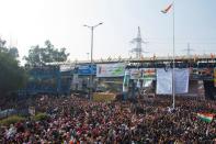 Demonstrators attend Republic Day celebrations at the protest site against a new citizenship law in Shaheen Bagh, area of New Delhi