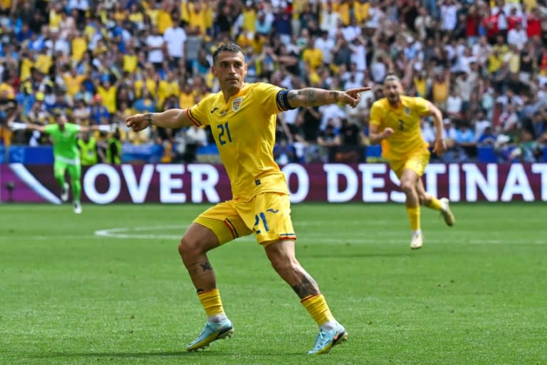 Romania's win was their first at any tournament since beating <a class="link " href="https://sports.yahoo.com/soccer/teams/england/" data-i13n="sec:content-canvas;subsec:anchor_text;elm:context_link" data-ylk="slk:England;sec:content-canvas;subsec:anchor_text;elm:context_link;itc:0">England</a> at Euro 2000 (Miguel MEDINA)