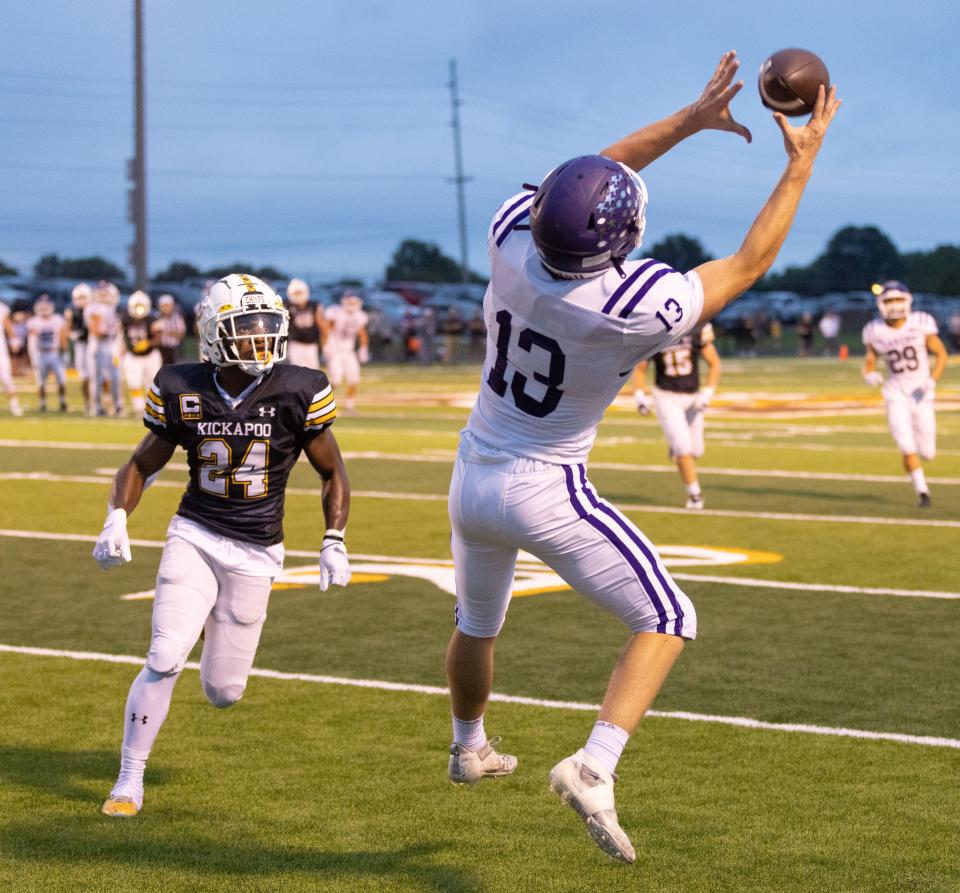 Camdenton’s Kam Durnin hauls in a pass against the Chief’s Samias Pickett at Kickapoo on September 2, 2022.