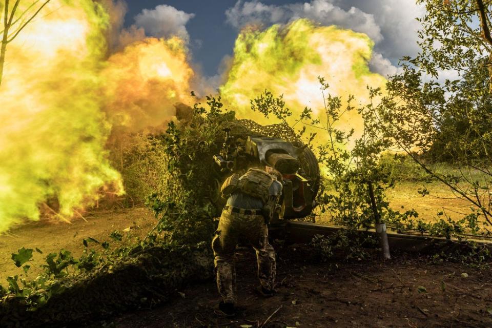 Ukrainian soldiers fire with D-30 artillery at Russian positions in the direction of Klishchiivka as the Russia-Ukraine war continues in Donetsk Oblast, Ukraine on August 12, 2023