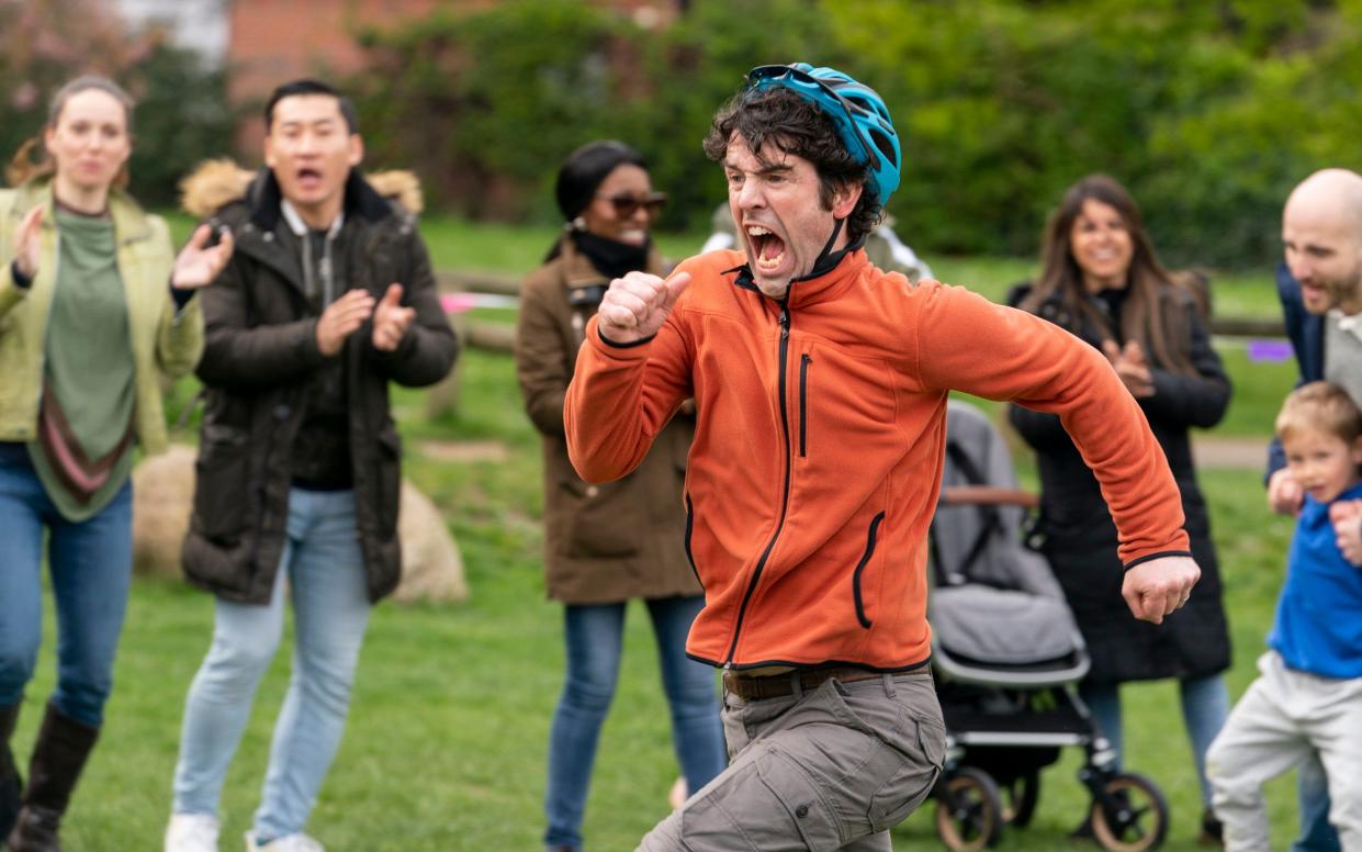 Kevin (Paul Ready) attempts to run off his 'mum guilt' at the sports day - BBC