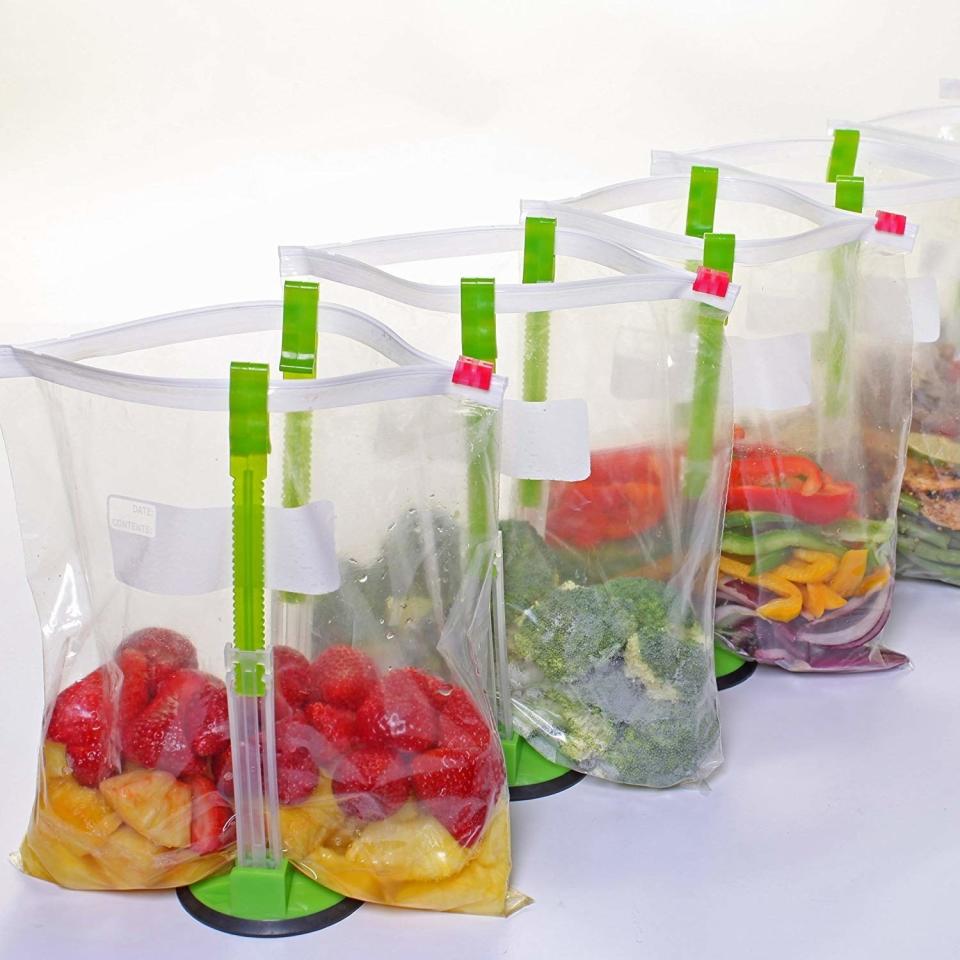 These hold bags upright so you can easily pour in leftovers instead of trying to do it yourself and having half of the food end up on the floor. We've all experienced that heartbreak, haven't we? Plus, you can also use the stand to help air dry bags after you've washed them.<br /><br /><strong>Promising review:</strong> "I have one of these that I purchased on Groupon a few years ago. I've SO wanted another but didn't know where to get one. SO glad to have found them again and have now ordered more. <strong>I'm a former professional chef and restaurant owner and, while I do love kitchen gadgets, they have to be WONDERFUL for me to give them room in my smaller home kitchen. THIS is one such gadget</strong>, so helpful for leftovers and for meal planning and freezing foods for later use." &mdash; <a href="https://www.amazon.com/gp/customer-reviews/R2CMYV9E1RVZKR?&amp;linkCode=ll2&amp;tag=huffpost-bfsyndication-20&amp;linkId=e282ba5f8979ed903d8834ed5a400276&amp;language=en_US&amp;ref_=as_li_ss_tl" target="_blank" rel="nofollow noopener noreferrer" data-skimlinks-tracking="5820833" data-vars-affiliate="Amazon" data-vars-href="https://www.amazon.com/gp/customer-reviews/R2CMYV9E1RVZKR?tag=bfabby-20&amp;ascsubtag=5820833%2C22%2C27%2Cmobile_web%2C0%2C0%2C16403853" data-vars-keywords="cleaning" data-vars-link-id="16403853" data-vars-price="" data-vars-product-id="20982223" data-vars-product-img="" data-vars-product-title="" data-vars-retailers="Amazon">E. bay</a><br /><br /><strong><a href="https://www.amazon.com/Original-Jokari-Sandwich-Storage-Solutions/dp/B0049NQEKO?&amp;linkCode=ll1&amp;tag=huffpost-bfsyndication-20&amp;linkId=645beb4847a47a8122f80279196ba3c9&amp;language=en_US&amp;ref_=as_li_ss_tl" target="_blank" rel="noopener noreferrer">Get a pack of two from Amazon for $11.35.</a></strong>