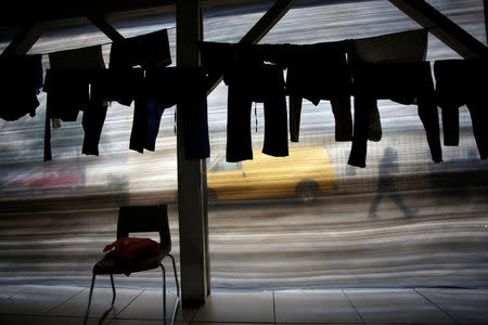 Freshly-washed clothing is hung out to dry at the Senda de Vida migrant shelter in Reynosa, in Tamaulipas state, Mexico June 22, 2018. Picture taken June 22, 2018. REUTERS/Daniel Becerril