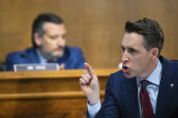 Sen. Josh Hawley, R-Mo., questions Attorney General Merrick Garland during a Senate Judiciary Committee hearing examining the Department of Justice on Capitol Hill in Washington, Wednesday, Oct. 27, 2021. Sen. Ted Cruz, R-Texas, listens at left. (Tom Brenner/Pool via AP)