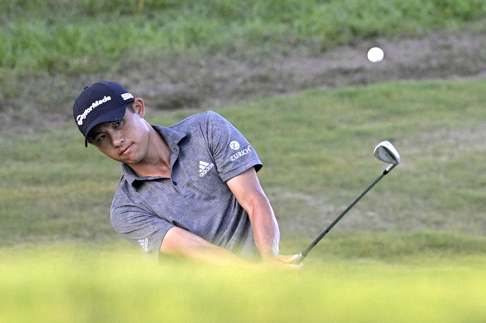 Collin Morikawa chips onto the 17th green during the final round of the Workday Championship golf tournament Sunday, Feb. 28, 2021, in Bradenton, Fla. (AP Photo/Phelan M. Ebenhack)