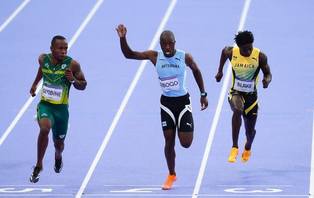 Letsile Tebogo racing during the men's 200m final