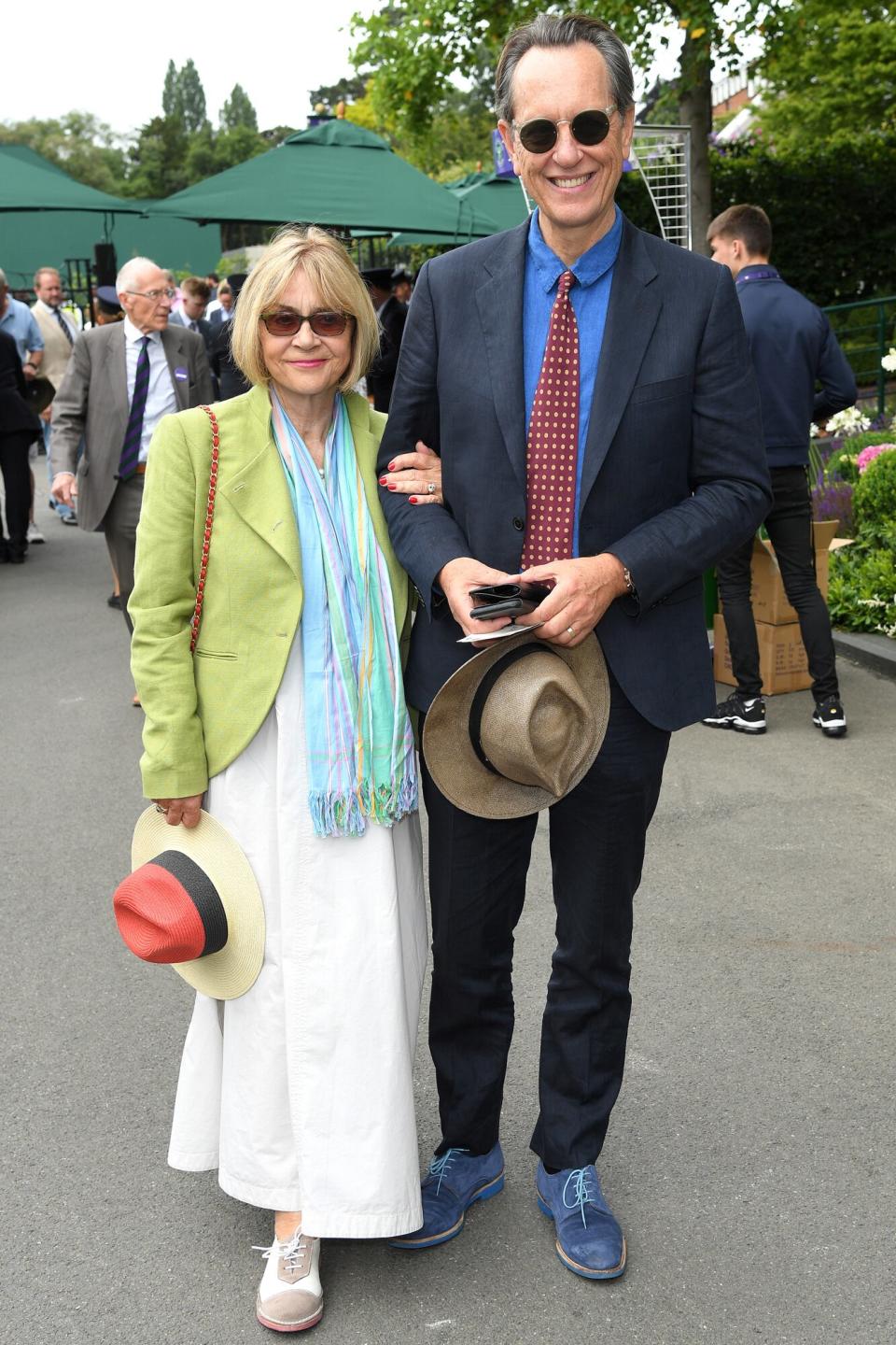 Joan Washington and Richard E Grant attend day eight of the Wimbledon Tennis Championships at All England Lawn Tennis and Croquet Club on July 09, 2019 in London, England.