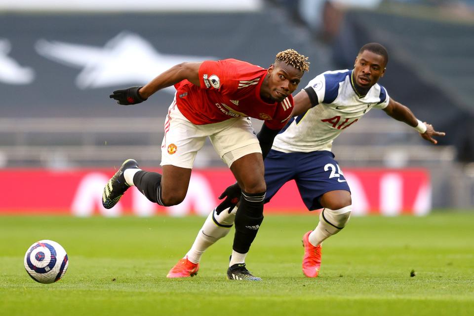 Paul Pogba contests for the ball with Serge Aurier (Getty)