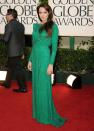 <p>Angelina Jolie in a shimmering emerald Versace. </p>