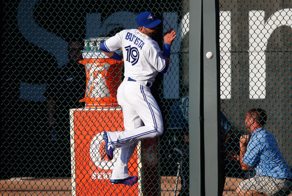 KANSAS CITY, MO - JULY 10: American League All-Star Jose Bautista #19 of the Toronto Blue Jays is unable to come up with a ball hit by National League All-Star Pablo Sandoval #48 of the San Francisco Giants as Sandoval gets a three-run triple in the first inning during the 83rd MLB All-Star Game at Kauffman Stadium on July 10, 2012 in Kansas City, Missouri. (Photo by Jamie Squire/Getty Images)