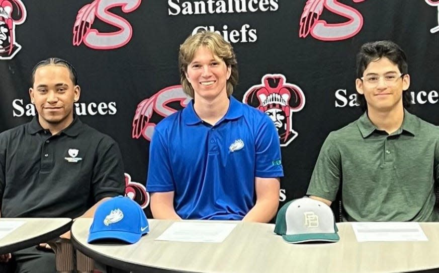 Keaton Kangas (middle) pictured with Santaluces teammates Samir Hurtado (left) and Matthew Martinez (right).