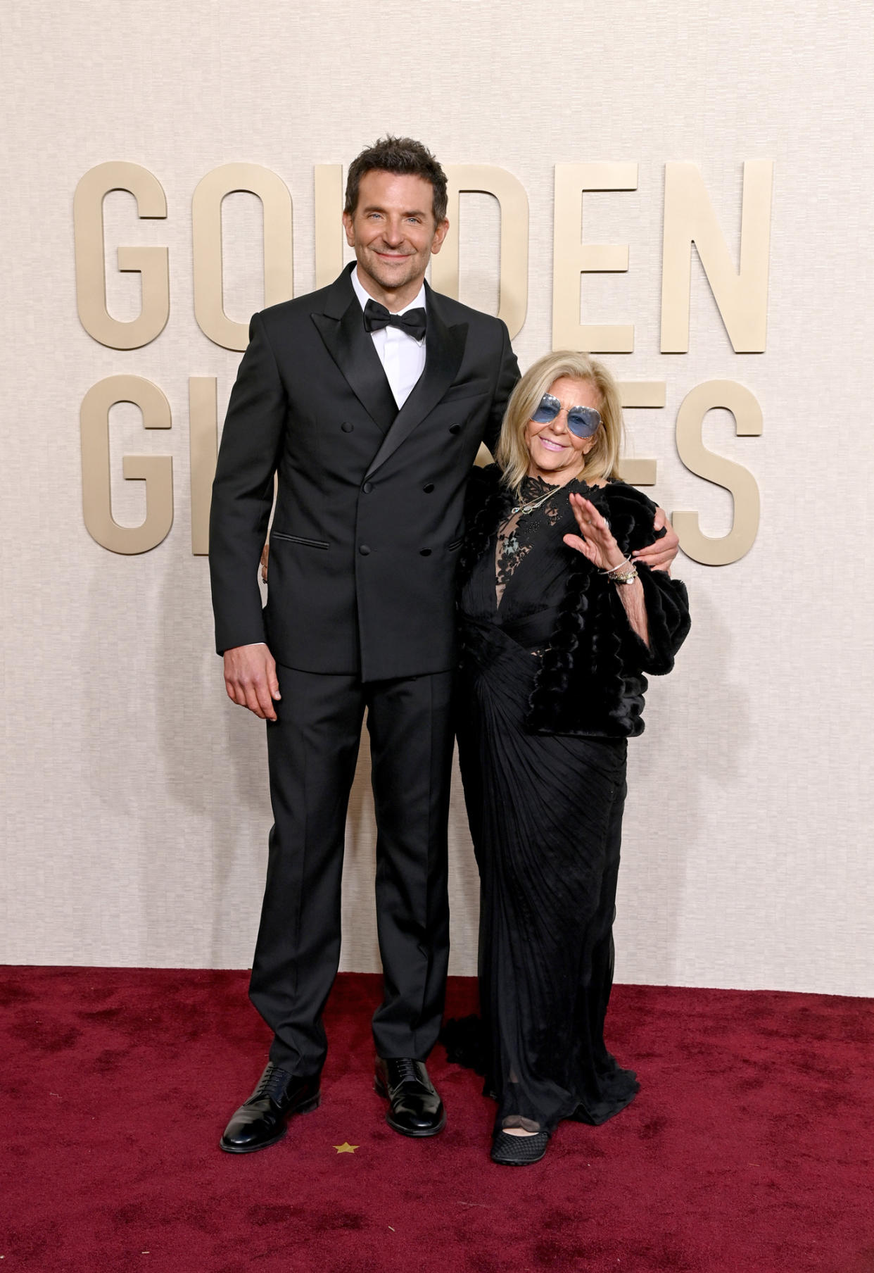 Bradley Cooper Makes His Mark on 2024 Golden Globes Red Carpet Alongside His Mom Gloria Campano