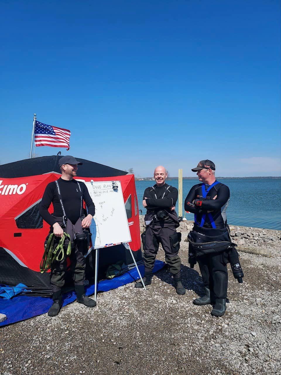 The volunteer dive team who found the statue, from left: Josh George, Richard Martin, and Jimmy Dawson.