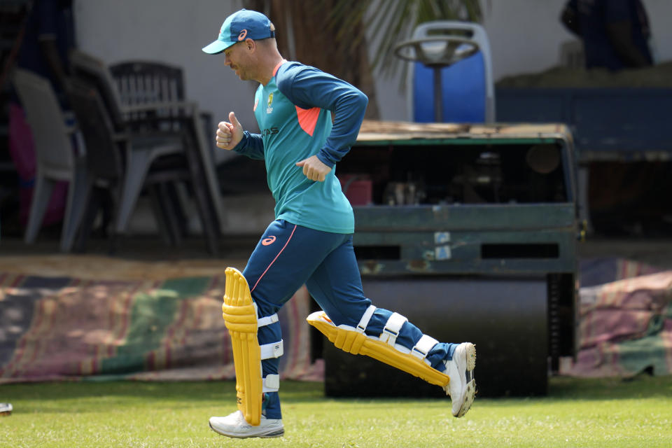 Australia's David Warner warms up before batting in the nets during a training session ahead of the third and last one day international cricket match between India and Australia in Chennai, India, Tuesday, March 21, 2023. (AP Photo/Aijaz Rahi)