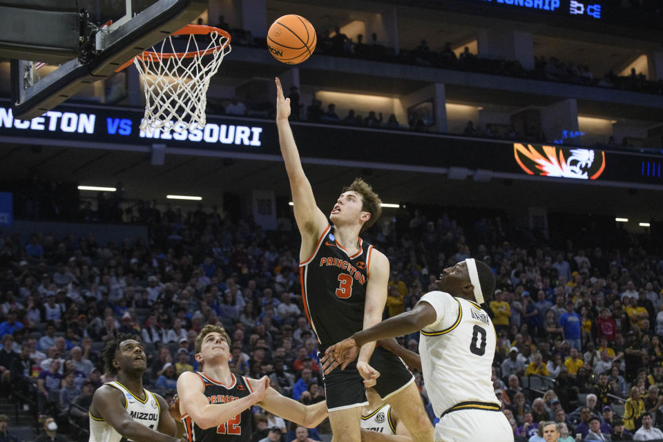 Princeton guard Ryan Langborg (3) lays the ball up over Missouri forward Mohamed Diarra (0) during the second half of a second-round college basketball game in the men's NCAA Tournament in Sacramento, Calif., Saturday, March 18, 2023. Princeton won 78-63. (AP Photo/Randall Benton)