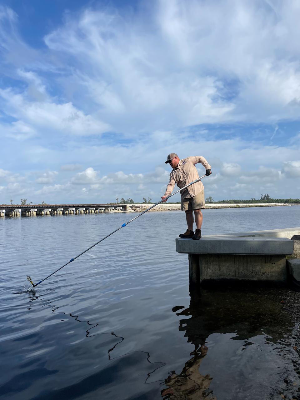 Calusa Waterkeeper Codty Pierce samples the Caloosahatchee for fecal bacteria in east Fort Myers. His nonprofit has been monitoring area waterways for signs of trouble for years - and often finds them.