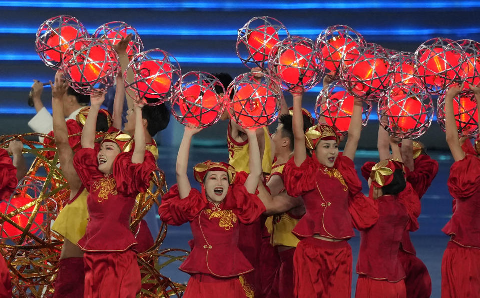 Artists perform ahead of the opening ceremony of the 19th Asian Games in Hangzhou, China, Saturday, Sept. 22, 2023. (AP Photo/Dita Alangkara)