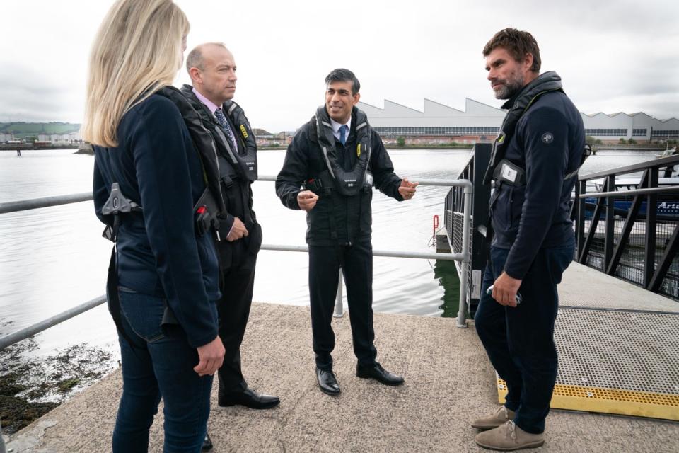 Rishi Sunak wears a life jacket during his visit to the Titanic Quarter (Stefan Rousseau/PA Wire)