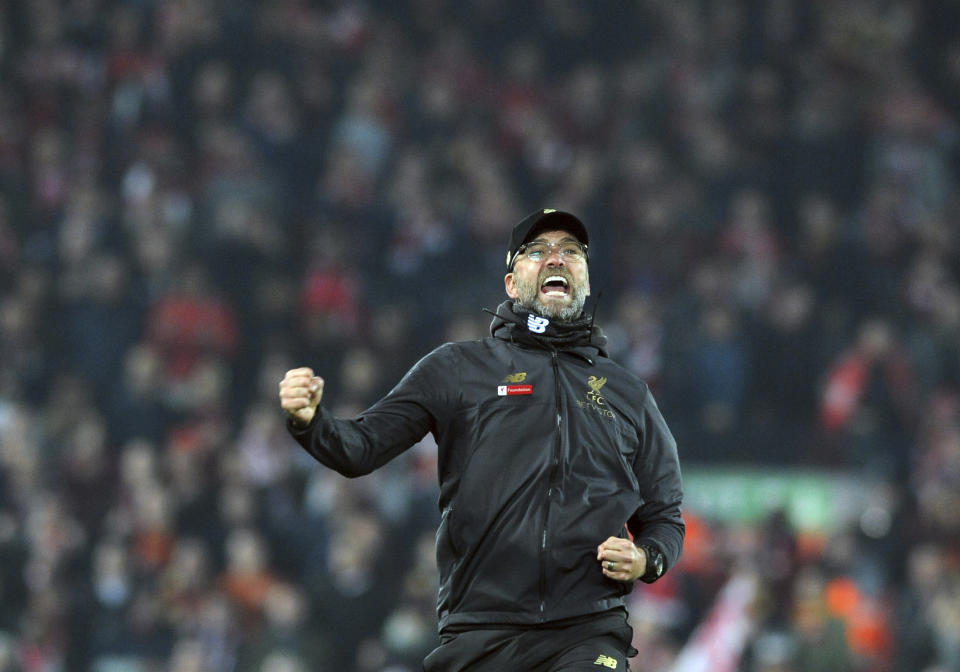 Liverpool manager Juergen Klopp celebrates at the end of the English Premier League soccer match between Liverpool and Watford at Anfield stadium in Liverpool, England, Wednesday, Feb. 27, 2019. (AP Photo/Rui Vieira)