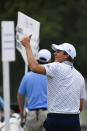 Carlos Ortiz, of Mexico, gestures to spectators as he walks off the 18th green after finishing the first round of the World Golf Championship-FedEx St. Jude Invitational tournament, Thursday, Aug. 5, 2021, in Memphis, Tenn. (AP Photo/John Amis)