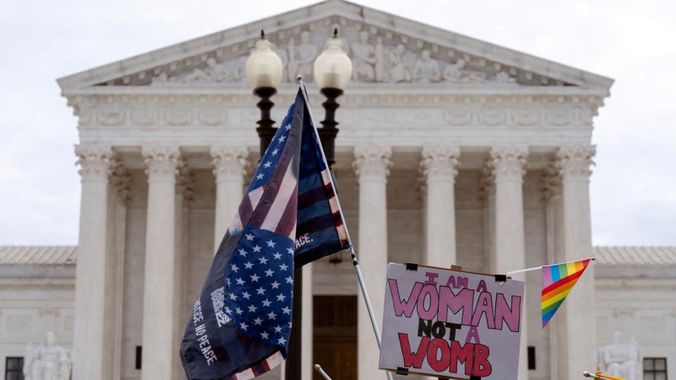 Abortion-rights activists protest outside of the U.S. Supreme Court on Capitol Hill in Washington, Tuesday, June 21, 2022. (AP Photo/Jose Luis Magana)