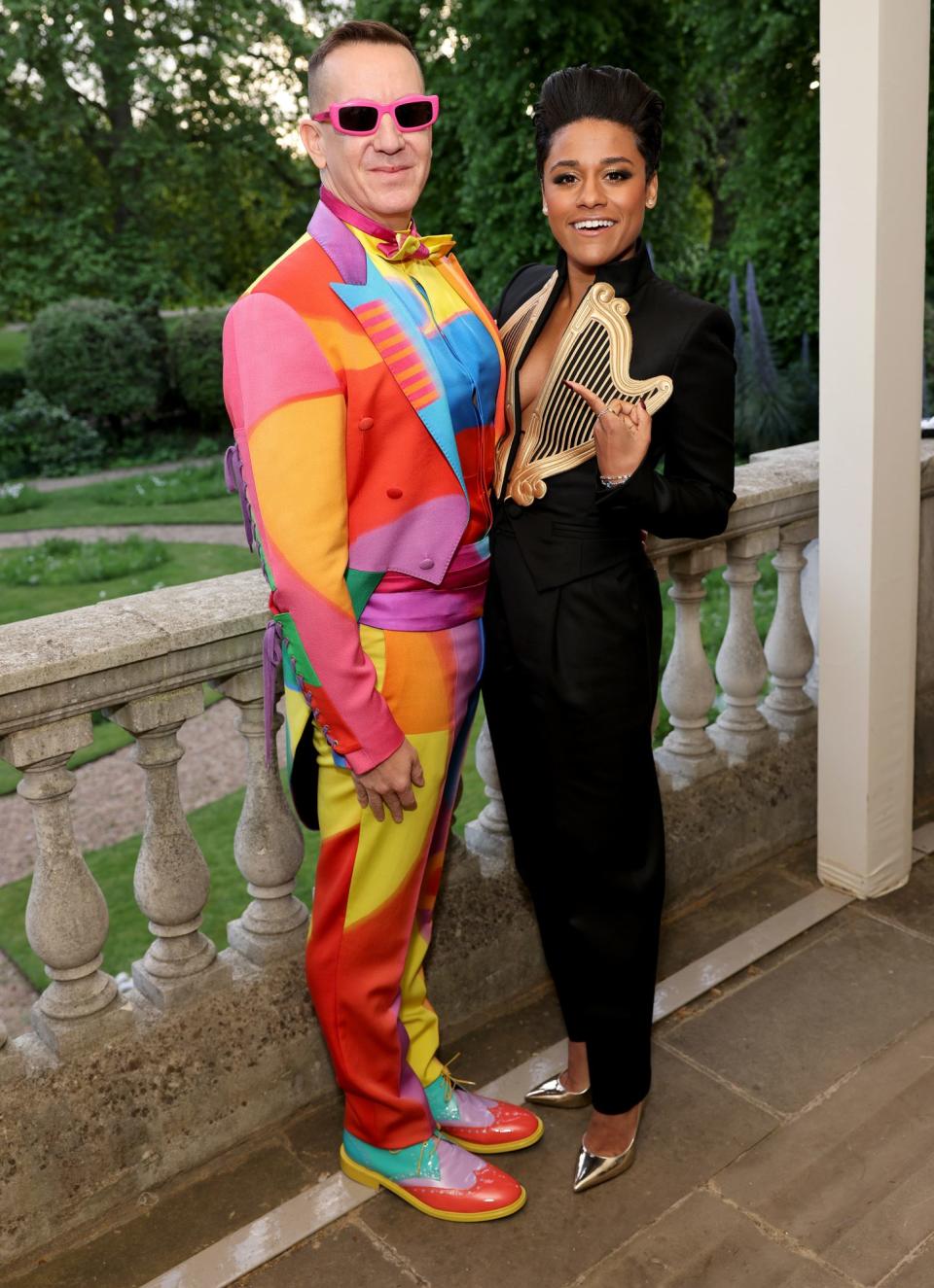 <p>Moschino creative director Jeremy Scott poses with actress Ariana De Bose at the launch of 'Moschino' by Assouline on May 12 in London. </p>