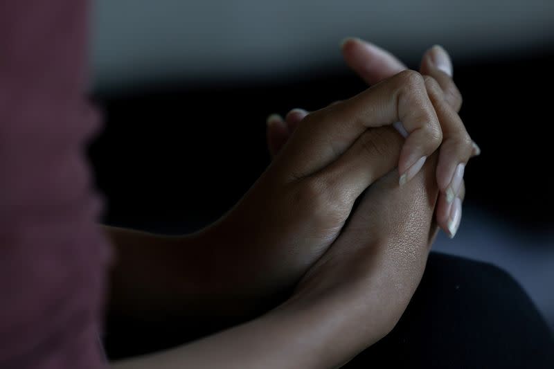 Fahima, 30-year-old a refugee from Afghanistan, sits in her sister's apartment in Virginia