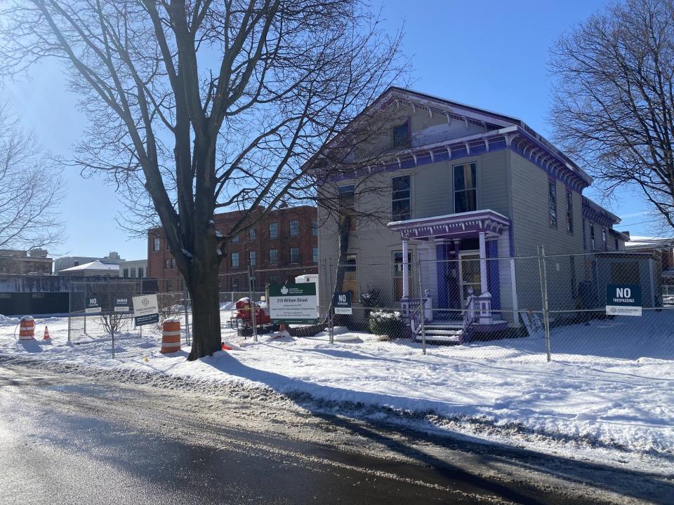 A look at the Stowell House building on William Street with the Warehouse building on Academy Place in the background.