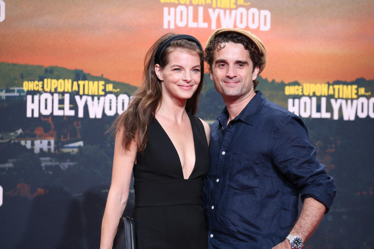 BERLIN, GERMANY - AUGUST 01: Yvonne Catterfeld and her husband Oliver Wnuk during the premiere of 