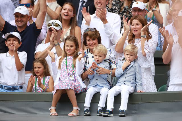 Tim Clayton/Corbis via Getty Roger Federer's wifeÂ Mirka FedererÂ and theirÂ four children, identical twin daughtersÂ Myla andÂ Charlene, 7, and identical 3-year-old twinÂ sonsÂ LeoÂ andÂ Lenny, cheer from the stands after the Gentlemen's Singles final won by Roger Federer during the Wimbledon Lawn Tennis Championships at the All England Lawn Tennis and Croquet Club at Wimbledon on July 16, 2017 in London, England.