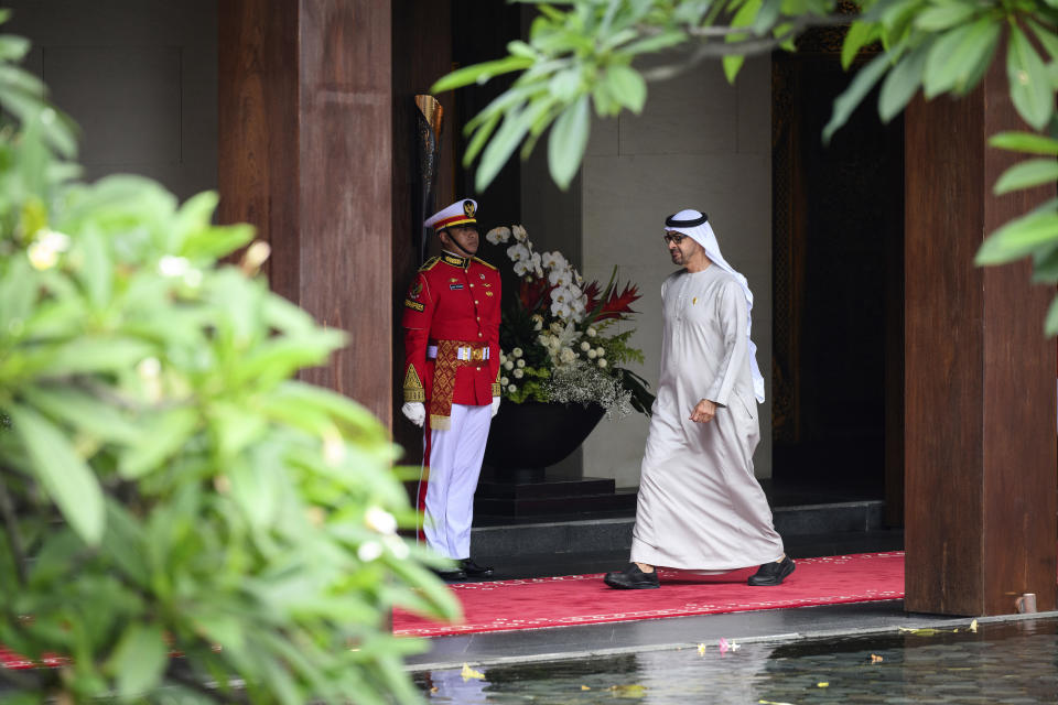 United Arab Emirates President Sheikh Mohamed bin Zayed Al-Nahyan arrives for the formal welcome ceremony to mark the beginning of the G20 Summit, in Nusa Dua, Indonesia, Tuesday Nov. 15, 2022. (Leon Neal/Pool Photo via AP)