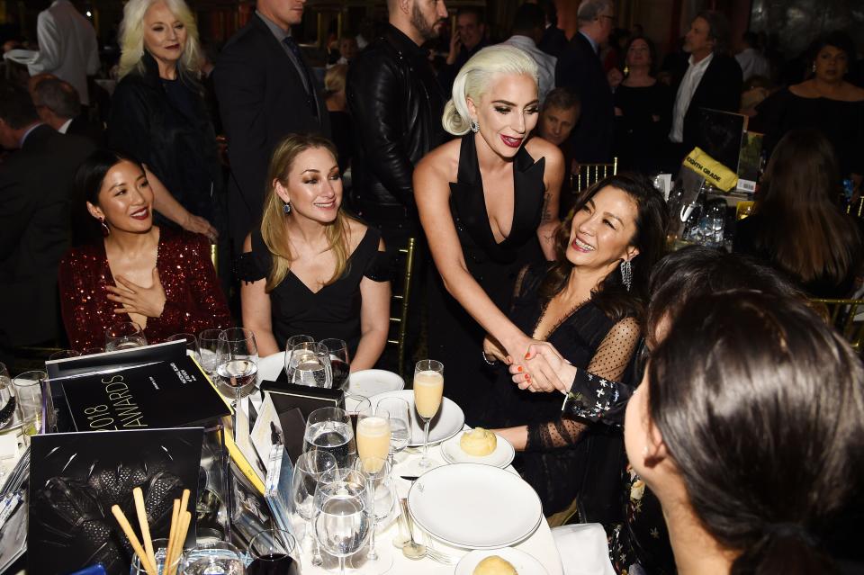 Constance Wu, left, Lady Gaga, center, and Michelle Yeoh, right, at the 2019 National Board of Review awards gala in New York. The annual dinner has been postponed this year because of COVID-19 concerns.