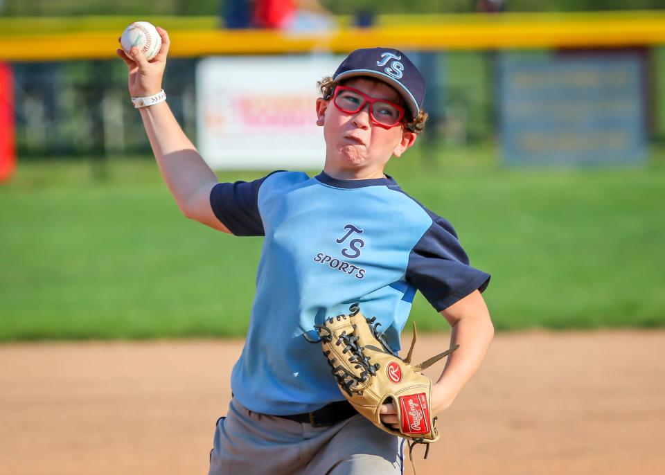 Donovan Libby of T.S. Sports grimaces as he delivers toward the plate. Libby and his teammates outscored their opponents by a score of 22 runs for vs. 6 against last week while going 2-0 on the week.