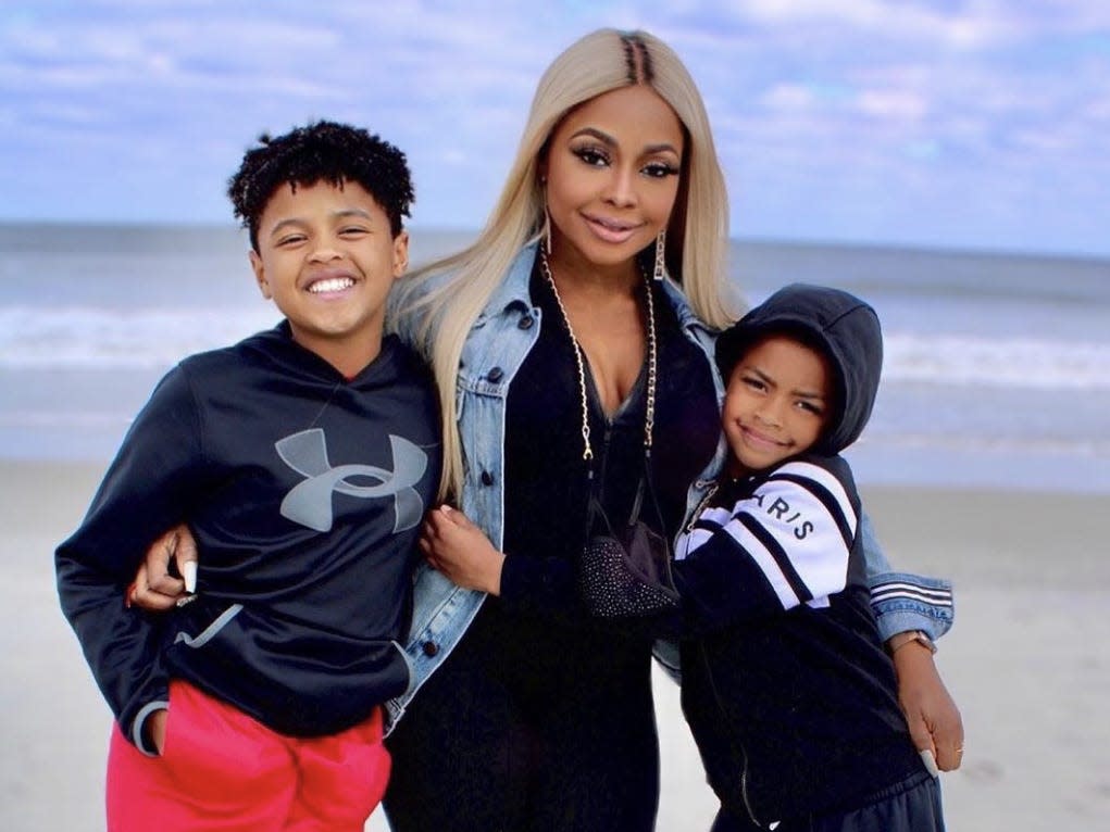 Ayden Nida, Phaedra Parks, and Dylan Nida on the beach.