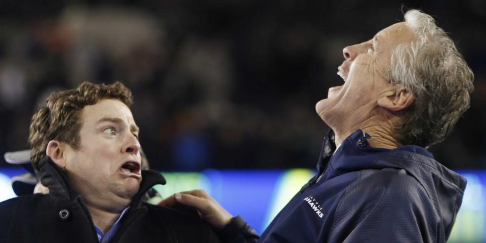 Super Bowl Seattle Seahawks general manager John Schneider (L) and head coach Pete Carroll