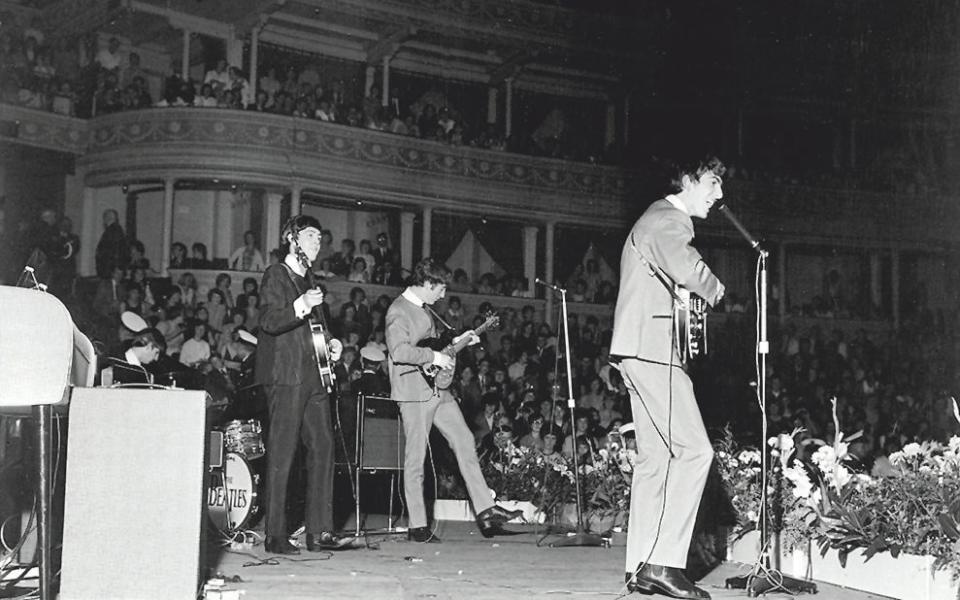 The Beatles perform in 1963 - Getty