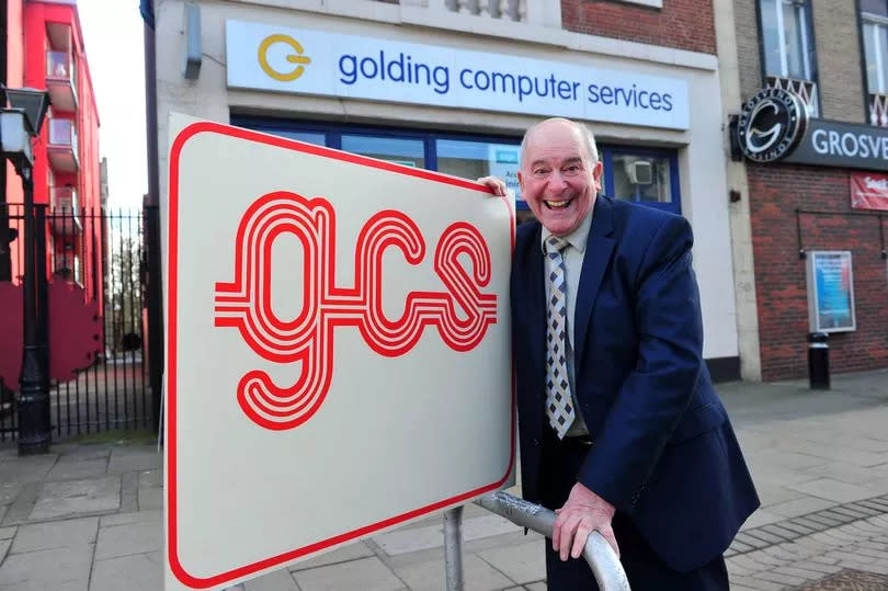 Vic Golding pictured with one of the original advertising boards he had on stage during a Take That concert in Hull