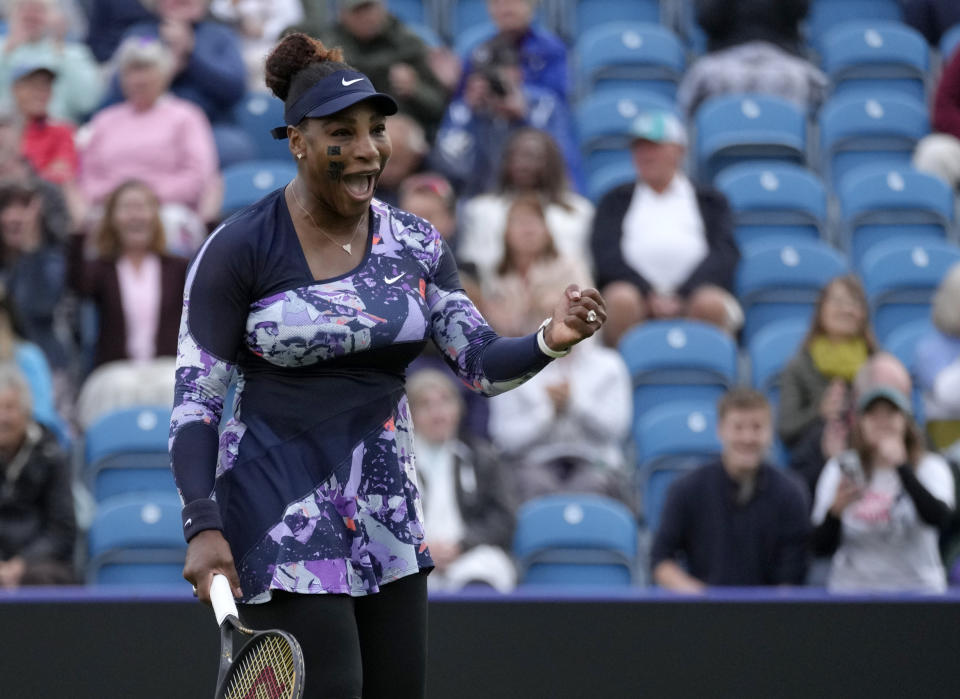 Serena Williams of the United States celebrates after wining their doubles tennis match with Ons Jabeur of Tunisia against Marie Bouzkova of Czech Republic and Sara Sorribes Tormo of Spain at the Eastbourne International tennis tournament in Eastbourne, England, Tuesday, June 21, 2022. (AP Photo/Kirsty Wigglesworth)