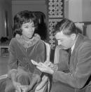 <p>Diahann Carroll was the first Black woman to win the Tony Award for Best Actress in a Musical (for <em>No Strings</em>, in 1962). Here, she's interviewed by reporter Charles Justice in her Central Park West apartment.</p>