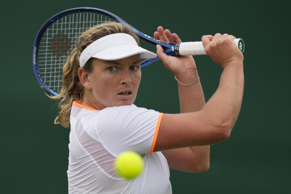 Coco Vandeweghe of the US plays a return to Belarus's Olga Govortsova during the women's singles first round match on day three of the Wimbledon Tennis Championships in London, Wednesday June 30, 2021. (AP Photo/Kirsty Wigglesworth)