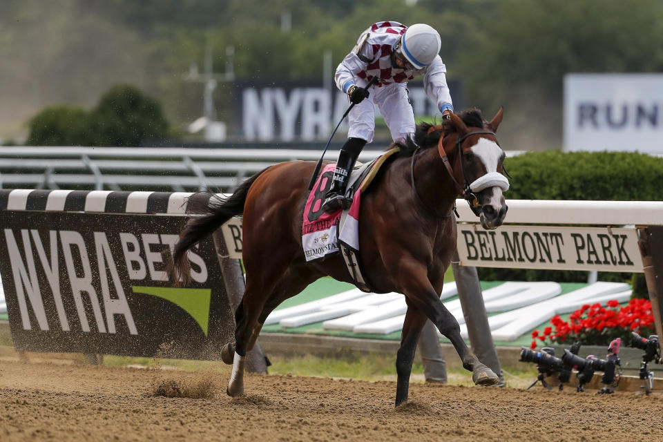 Tiz the Law (8), with jockey Manny Franco up, crosses the finish line to win the152nd running of the Belmont Stakes horse race, Saturday, June 20, 2020, in Elmont, N.Y. (AP Photo/Seth Wenig)