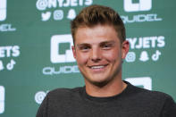 New York Jets' quarterback Zach Wilson speaks to reporters after a practice at the NFL football team's training facility in Florham Park, N.J., Tuesday, May 24, 2022. (AP Photo/Seth Wenig)