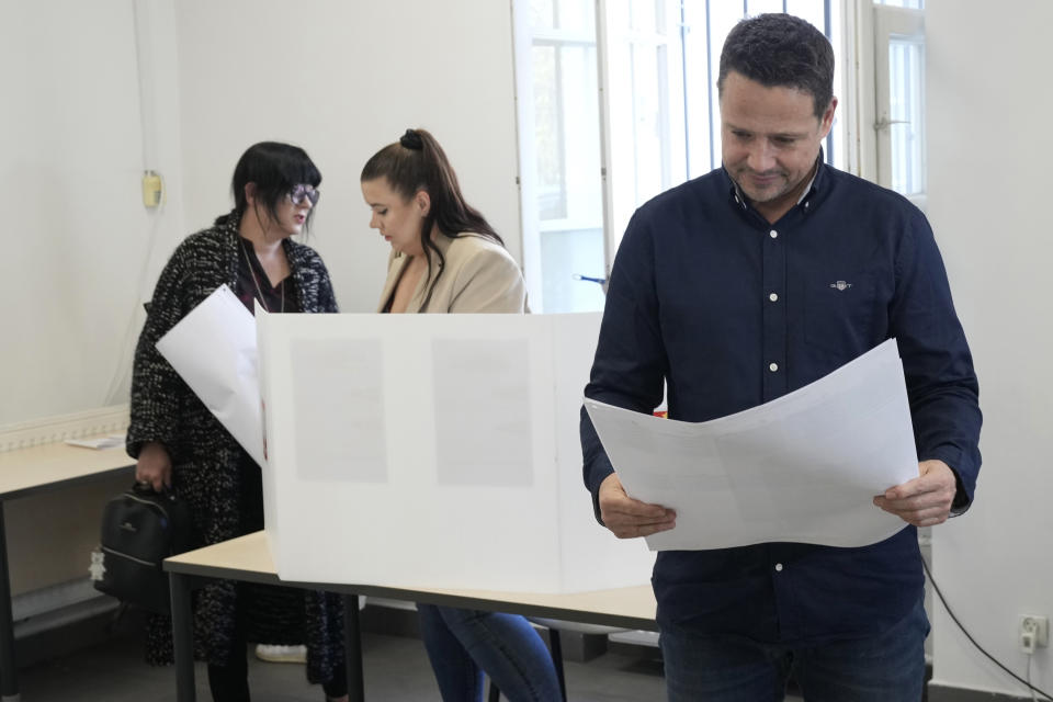 Warsaw's Mayor Rafal Trzaskowski, who is a member of Prime Minister Donald Tusk's ruling party, votes in local elections in Warsaw, Poland, Sunday April, 7, 2024. The vote is the first test at the ballot box for Prime Minister Donald Tusk four months after he took office. (AP Photo/Czarek Sokolowski)