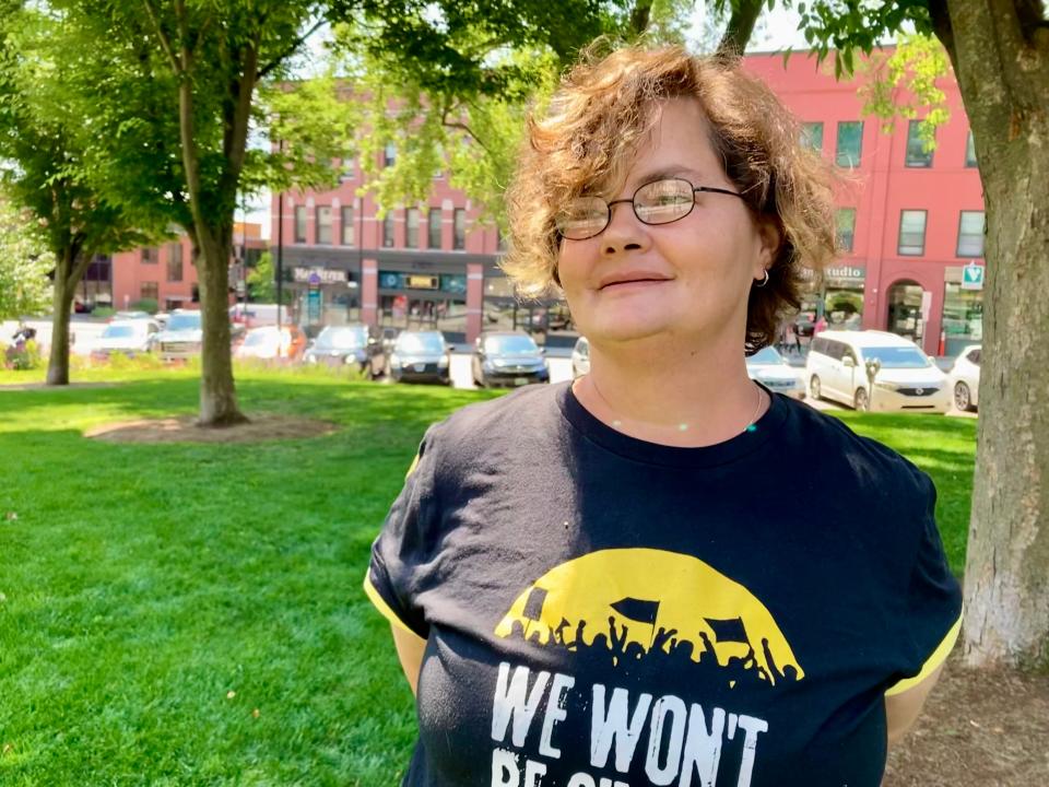 Ronni Liddell is Mom of her City Hall Park friends, who hang out on the western side of the park and are the self-proclaimed "weed heads." Liddell used to be homeless and now checks on her friends, unhoused and housed, at the park every week.