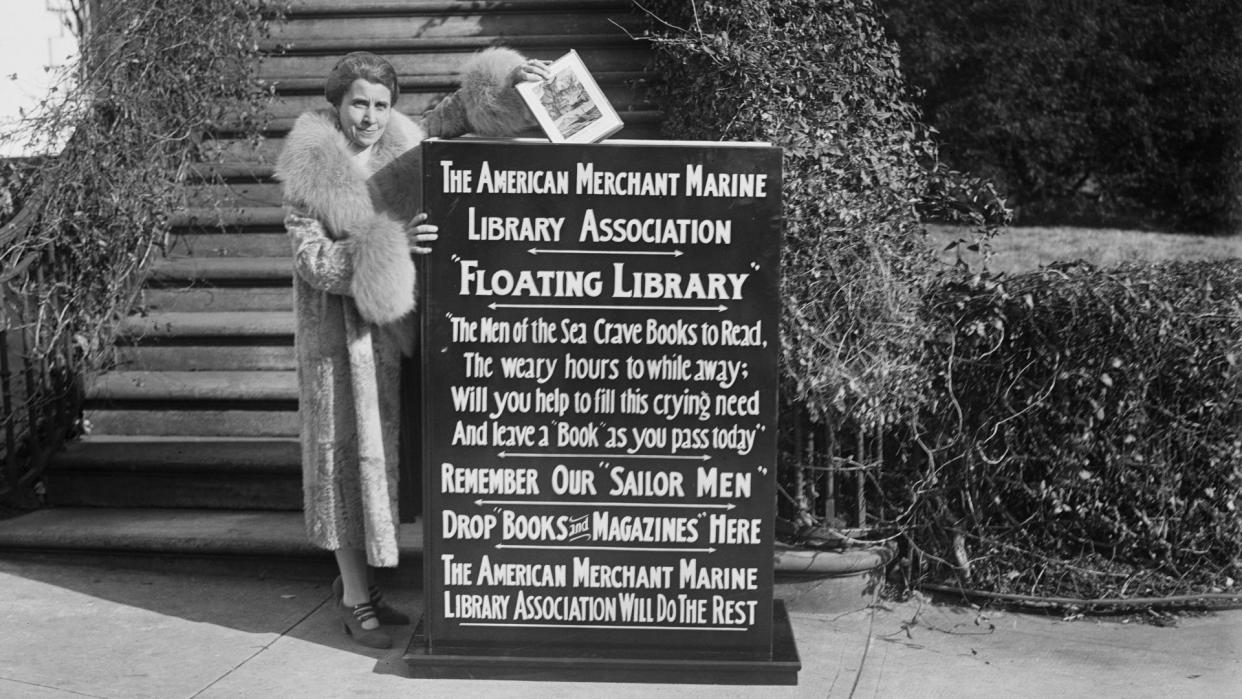 Mandatory Credit: Photo by Glasshouse Images/Shutterstock (9036562a)First Lady Grace Coolidge Dropping First Book into Box That Started Drive by American Merchant Marine Library Association for 'Floating Library' for Sailors, Washington DC, USA, Harris & Ewing, January 1929VARIOUS.