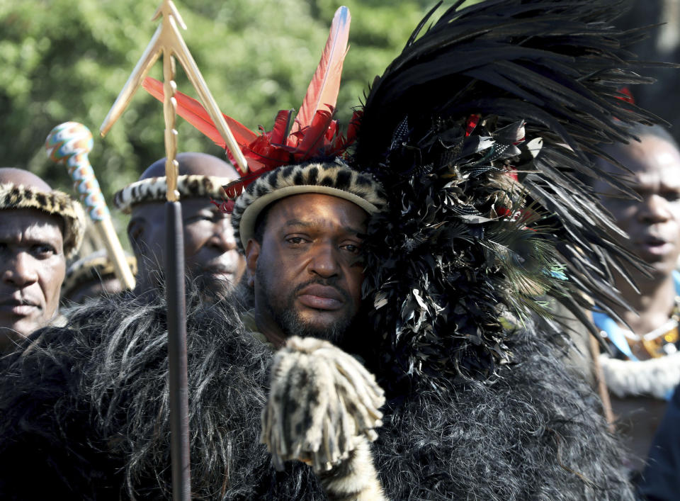 King Misuzulu ka Zwelithini looks on, during a coronation event, at KwaKhangelamankengane Royal Palace in Nongoma, South Africa. Saturday, Aug. 20, 2022. South Africa’s ethnic Zulu nation hosted a coronation event for its new traditional king amid internal divisions that have threatened to tear the royal family apart. King Misuzulu ka Zwelithini, a son of the late King Goodwill Zwelithini who died from a diabetes-related illness in March last year, will undergo the traditional ritual known as ukungena esibayeni (entering the royal village) to mark his installation as the new leader of the Zulu nation. (AP Photo)